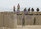 Les barrières de la défense de champ de tir de la CE d'Eu d'OIN ont soudé le mur de sable de bastion